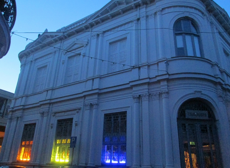 An old mansion on Faneromeni Square lit up at night